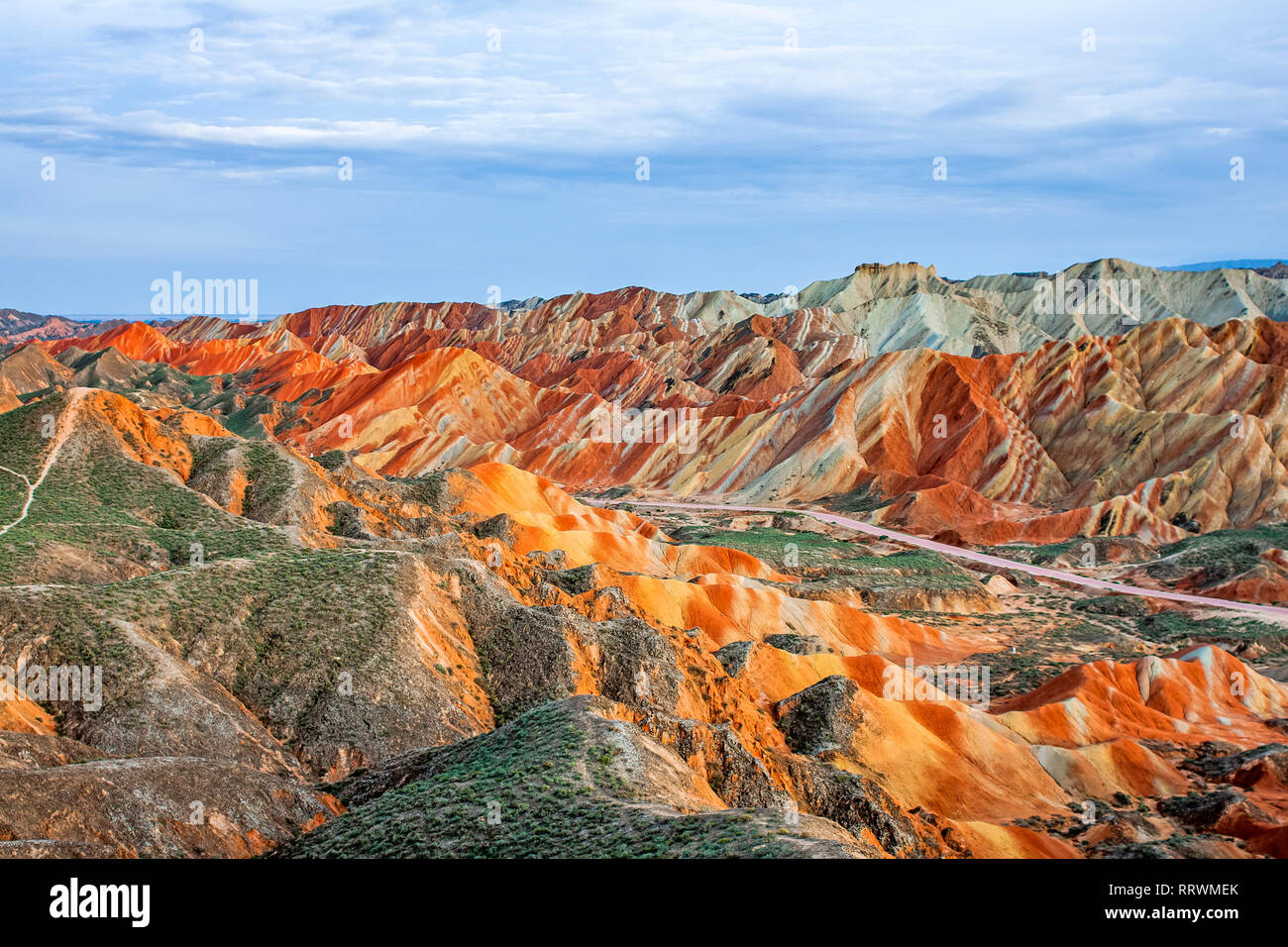 Amazing View of Rainbow Mountains Geological Park. Stripy Zhangye Danxia Landform Geological Park in Gansu Province, China. Sharp Peaks and Road Stock Photo