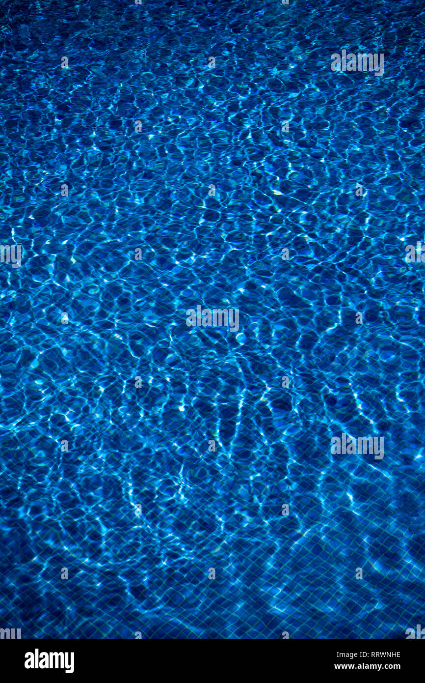 Ripples in a pool with a tiled background Stock Photo Alamy