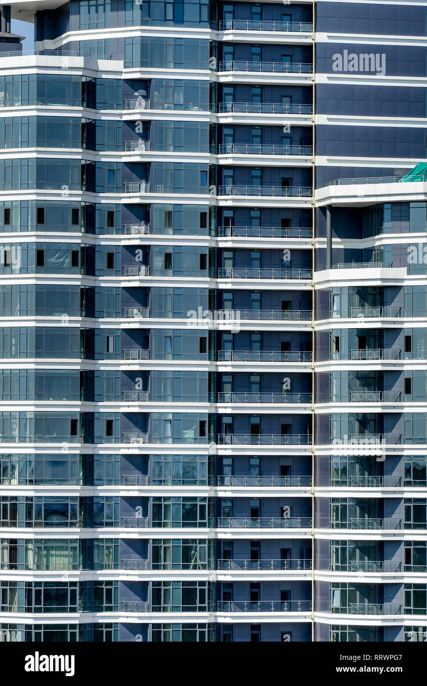 Modern glass facade skyscraper office center. Stock Photo
