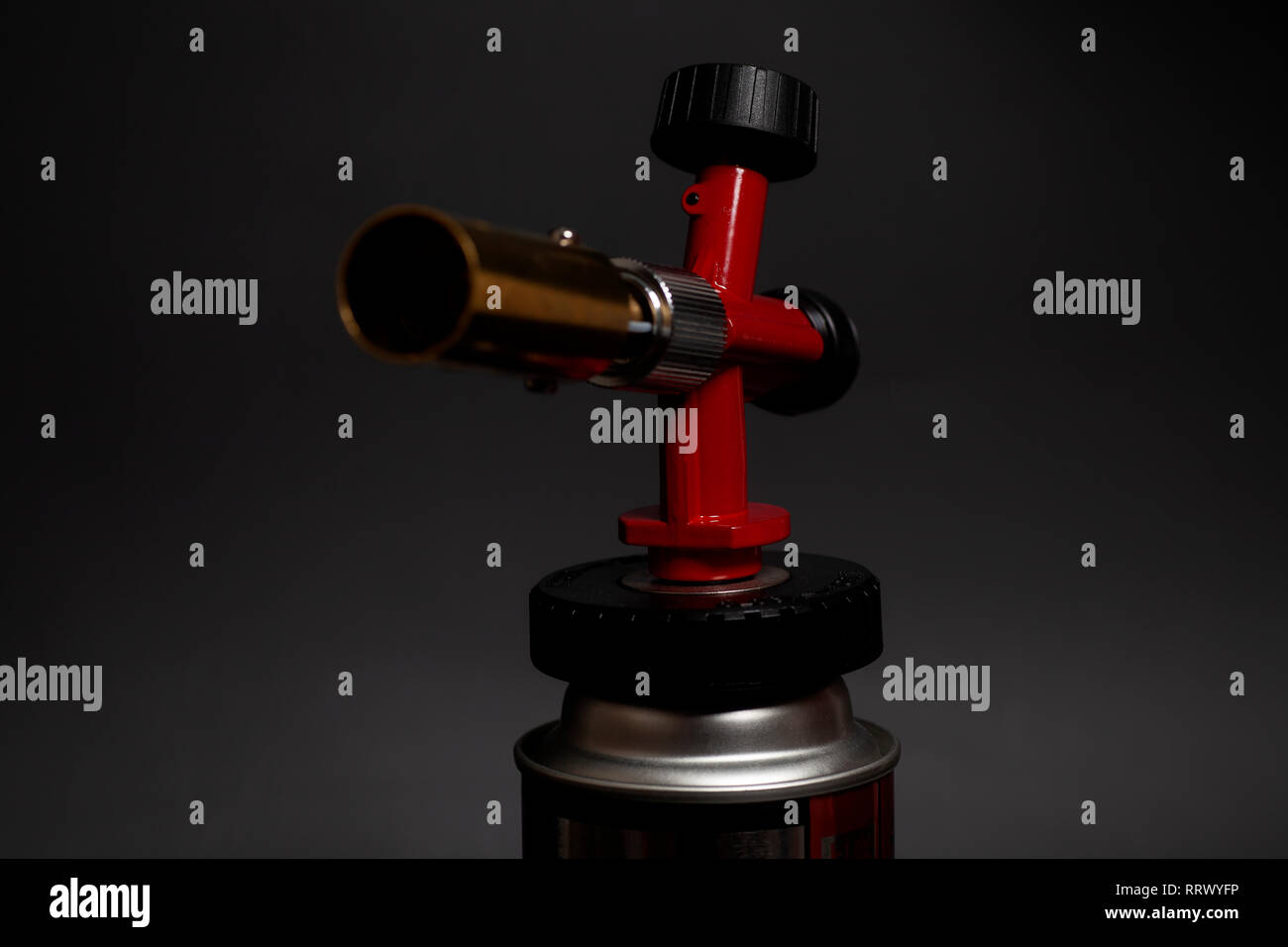 Manual gas burner isolated on black background Stock Photo Alamy