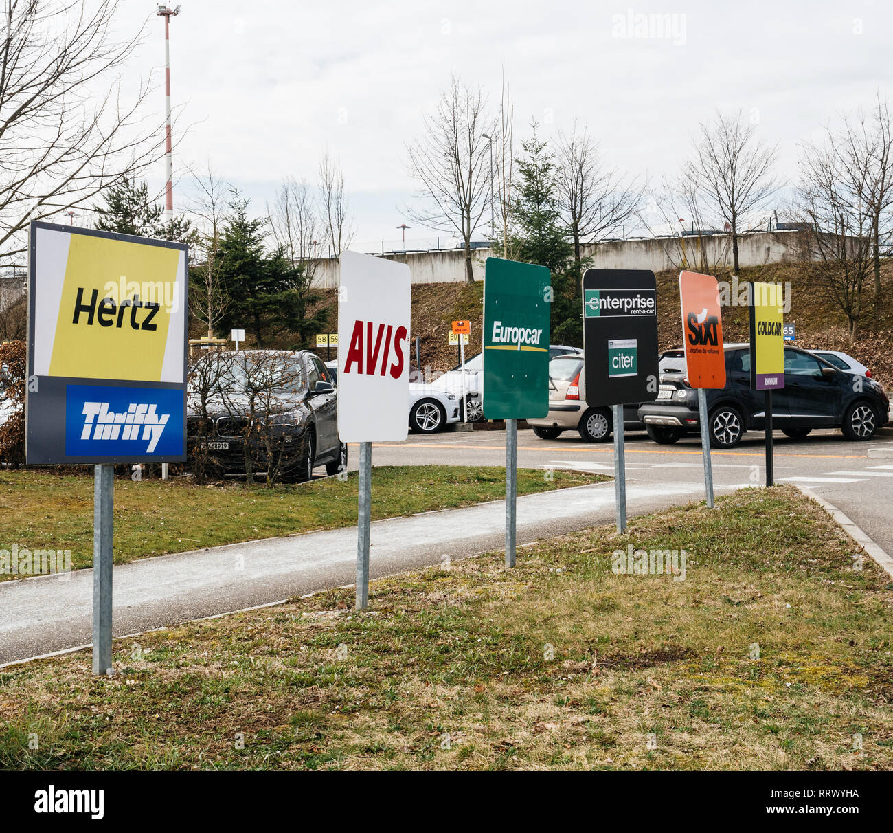 BASEL, SWITZERLAND - MAR 22, 2018: Rent-a-car signage at parking of  EuroAirport - Basel Mulhouse Freiburg modern airport, Hertz, Avisa, sixt,  goldcar Stock Photo - Alamy