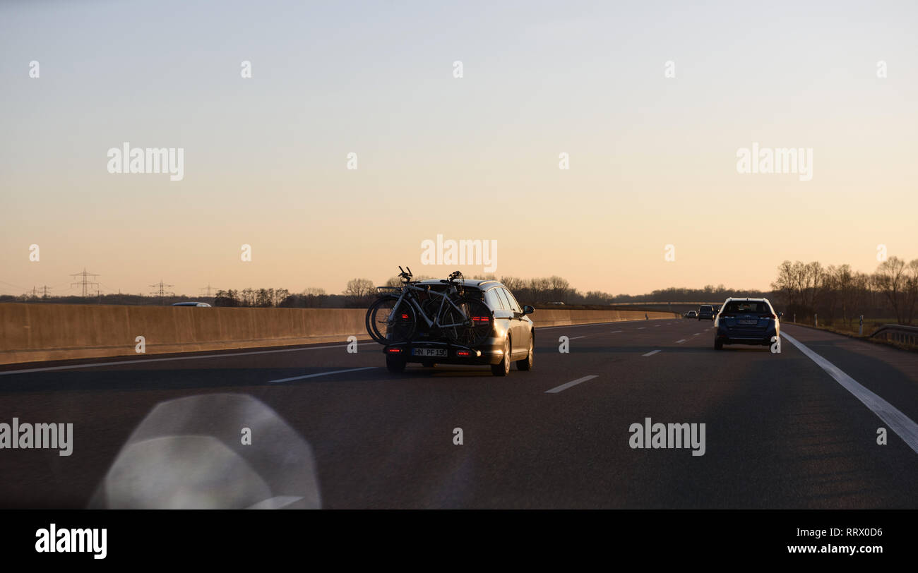 Germany - Feb 25, 2018: Wide image of rear view of car with bicycle ...