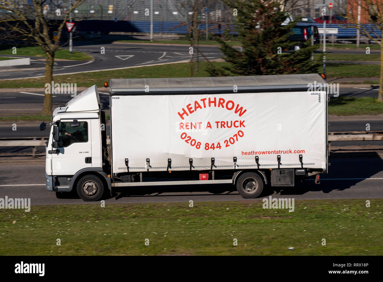 Heathrow Rent A Truck. MAN TGL tautliner, curtainsider, curtain sided vehicle, lorry. Hire company Stock Photo