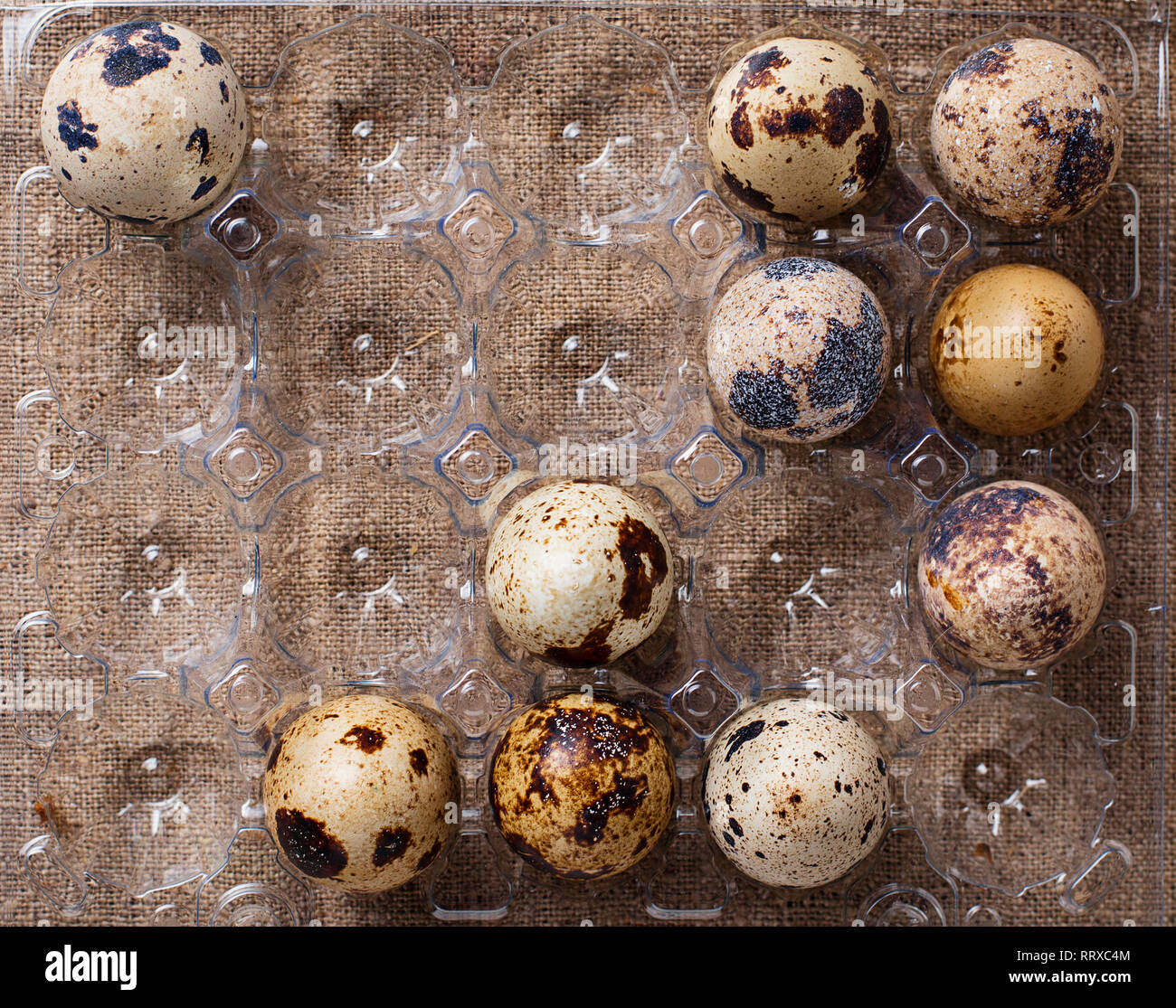 Quail eggs on linen background Stock Photo - Alamy