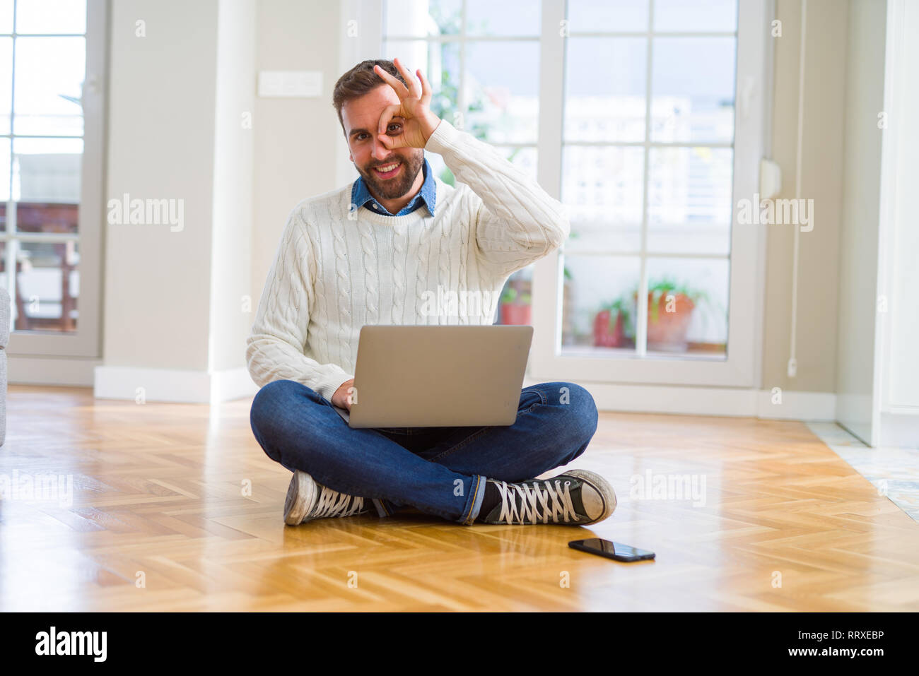 Handsome man wearing working using computer laptop with happy face ...