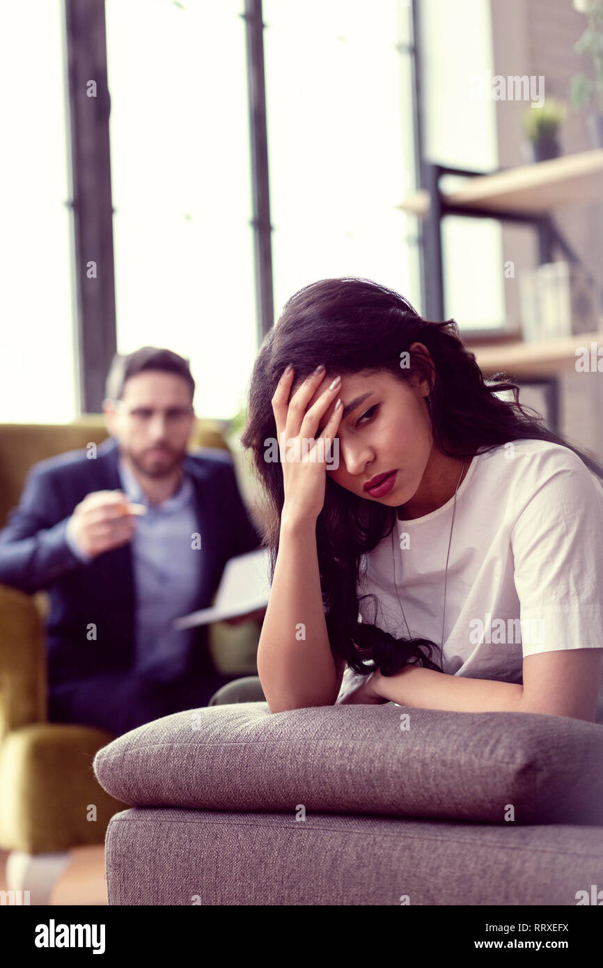 Depressed young woman having problems in life Stock Photo