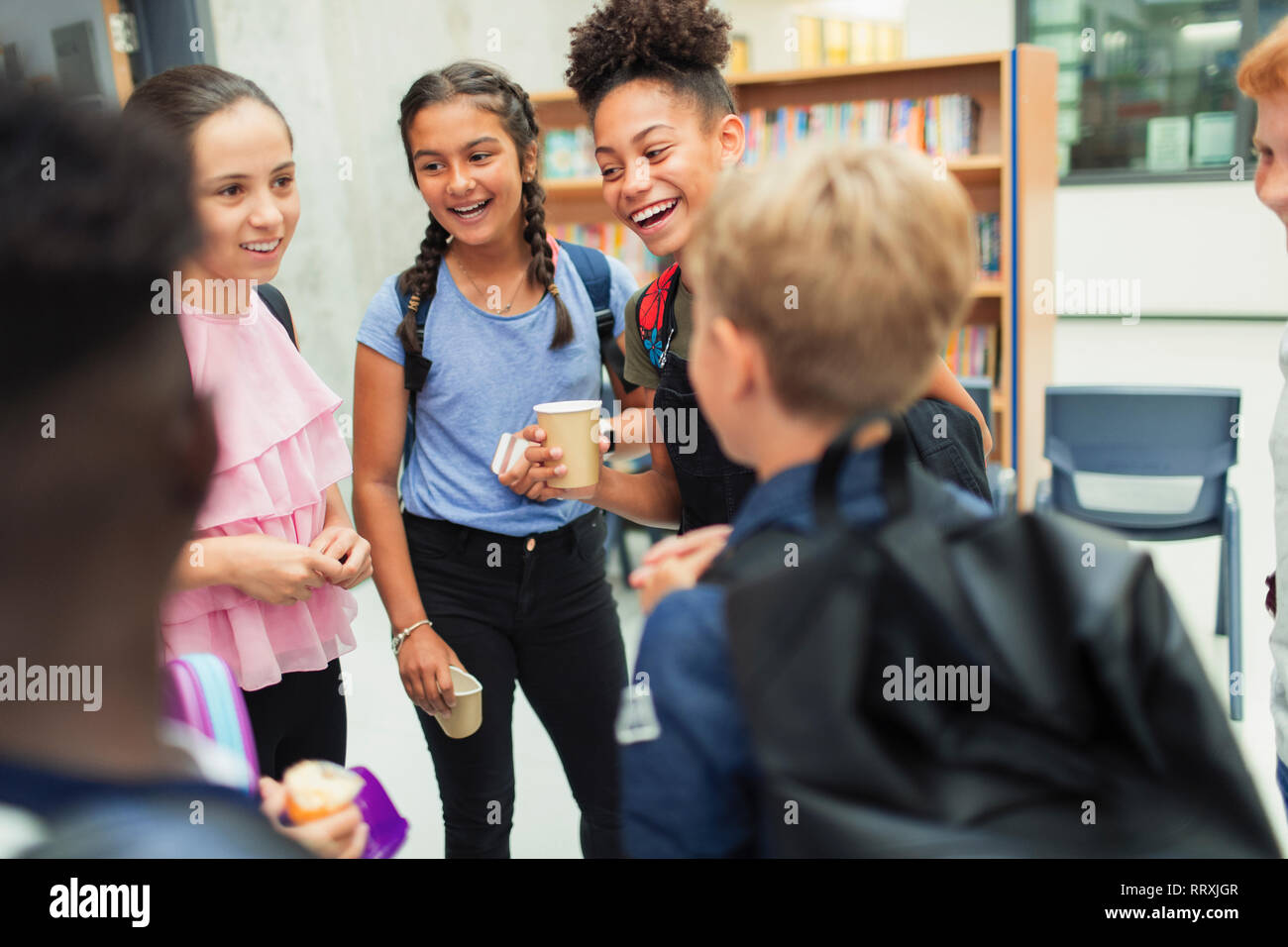 Junior high students talking, hanging out Stock Photo