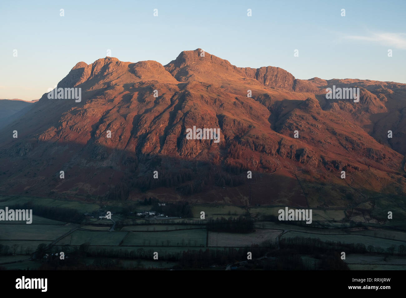 First light over the Langdale Pikes from Side Pike, Great Langdale, Lake District, UK Stock Photo