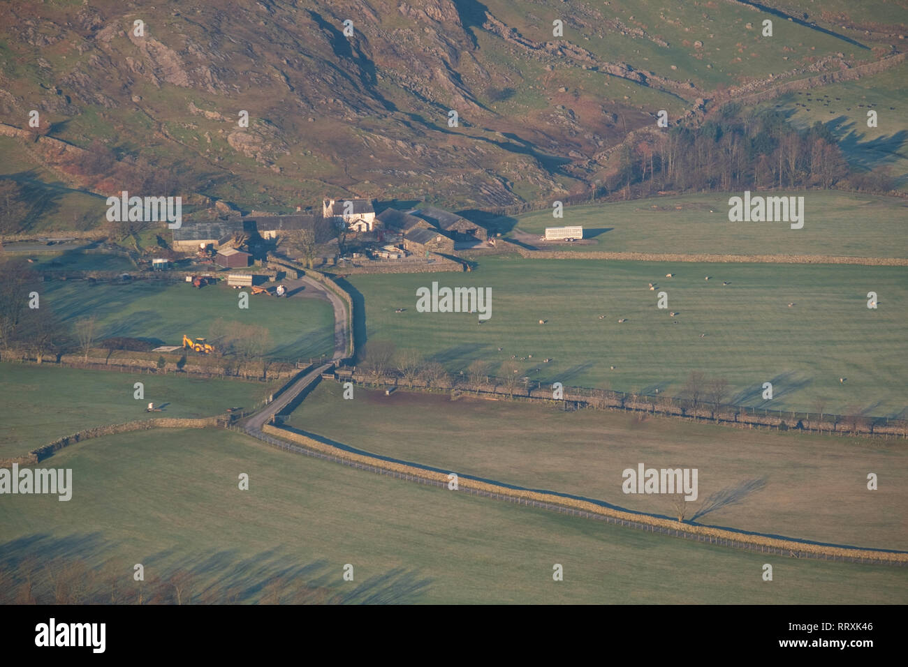 Early morning light over Stool End farm, Great Langdale, Lake District, UK Stock Photo