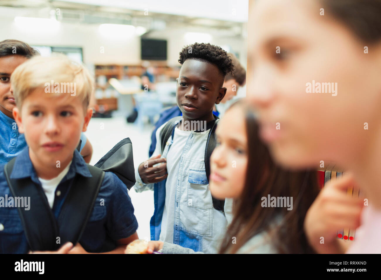 Junior high students in library Stock Photo