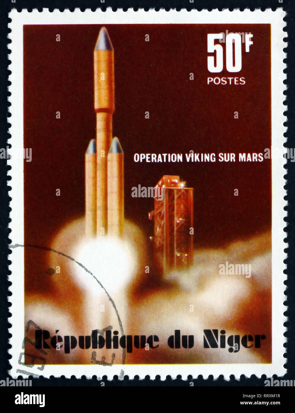 NIGER - CIRCA 1977: a stamp printed in Niger shows Titan Rocket Launch, Viking Mars Project, circa 1977 Stock Photo