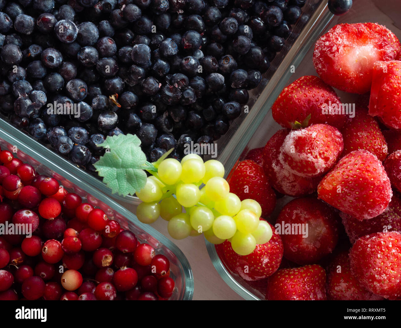 Ripe blueberries, strawberries, grapes.Top view. Background berries