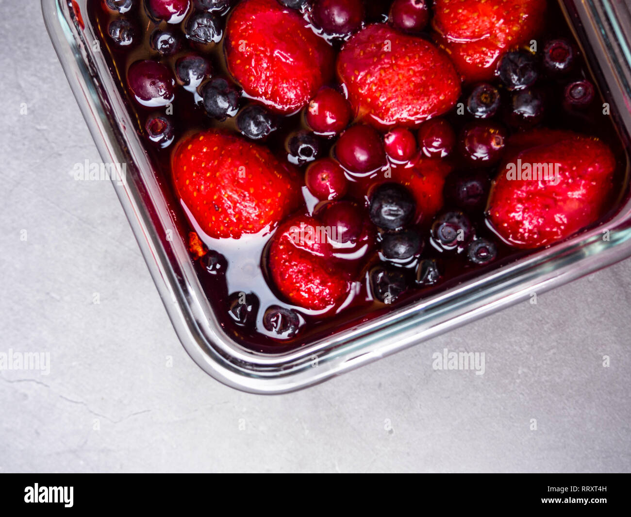 Top view of mixed jelly fruits ( strawberry, blueberry, cranberry