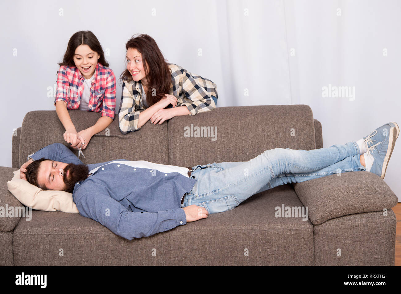 Family Prank Mom And Daughter Going To Cut Beard Sleeping Dad Lets Have Fun Cheerful Girls With Scissors Cut Long Fathers Beard Just For Fun He Needs Beard Grooming Cut His Beard