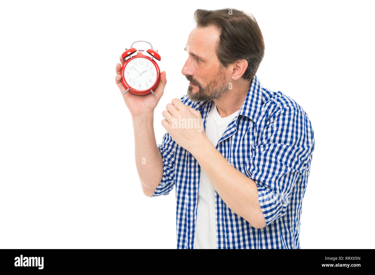 Time is marching on. Senior man looking at clock. Bearded man with ...