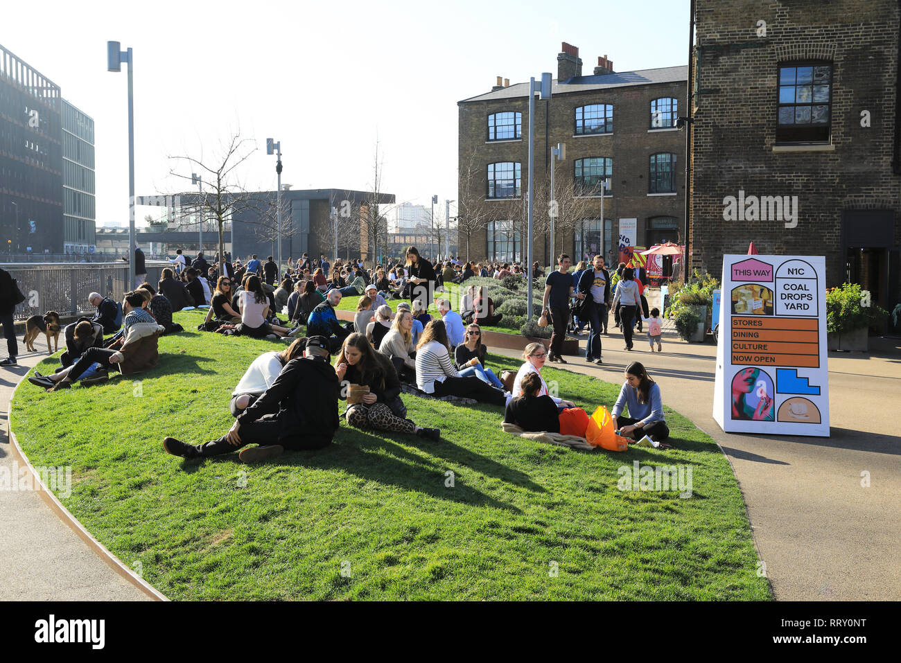 Early spring sunshine on Wharf Road Gardens near Granary Square at