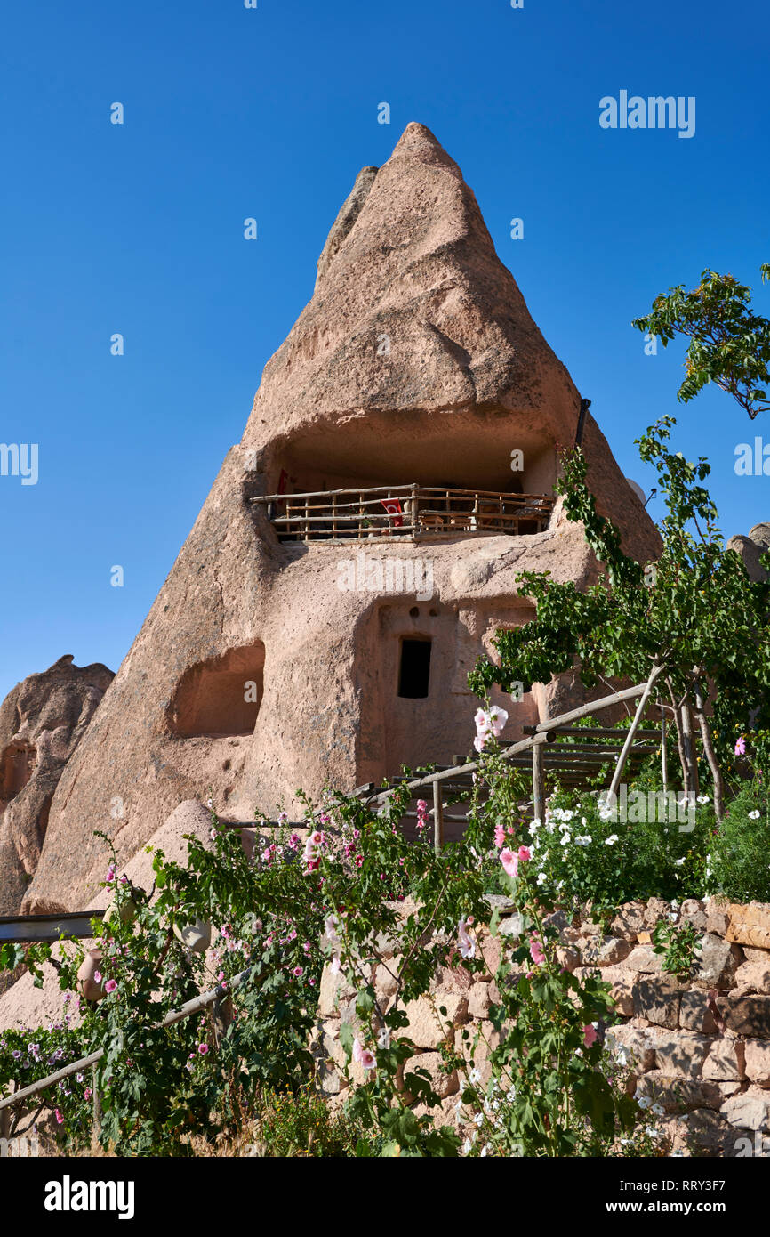 Cafeteria Balkonlu a typical fairy chimney cave house, Uchisar, near Goreme, Cappadocia, Nevsehir, Turkey Stock Photo