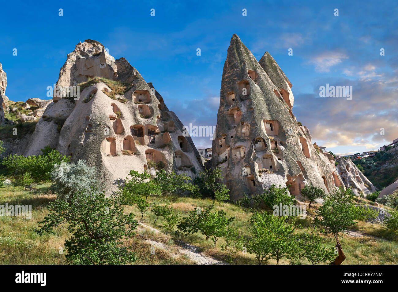 Pictures & images of the cave city houses in the rock formations & fairy chimney of Uchisar, near Goreme, Cappadocia, Nevsehir, Turkey Stock Photo