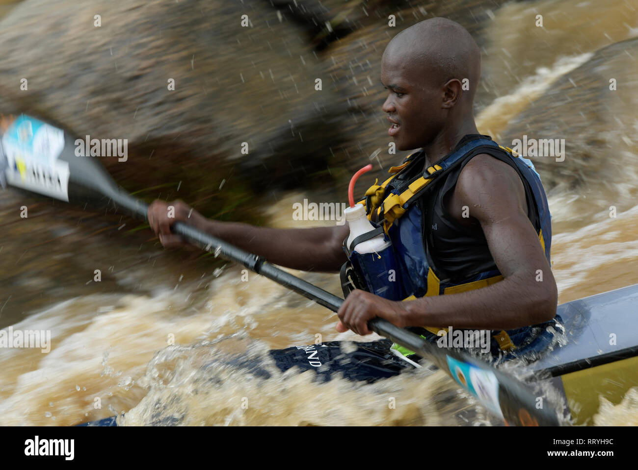 Durban, KwaZulu-Natal, South Africa, adult man, competitor, paddle canoe, rapids, 2019 FNB Dusi Canoe Marathon, canoeing, people, sport, blur Stock Photo
