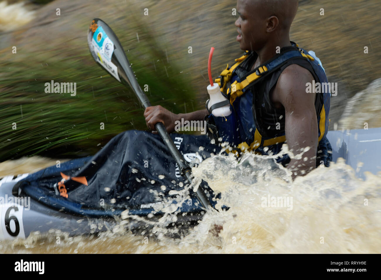 Durban, KwaZulu-Natal, South Africa, single adult man, paddle boat, 2019, Dusi Canoe marathon, competitor, movement, action, sport Stock Photo