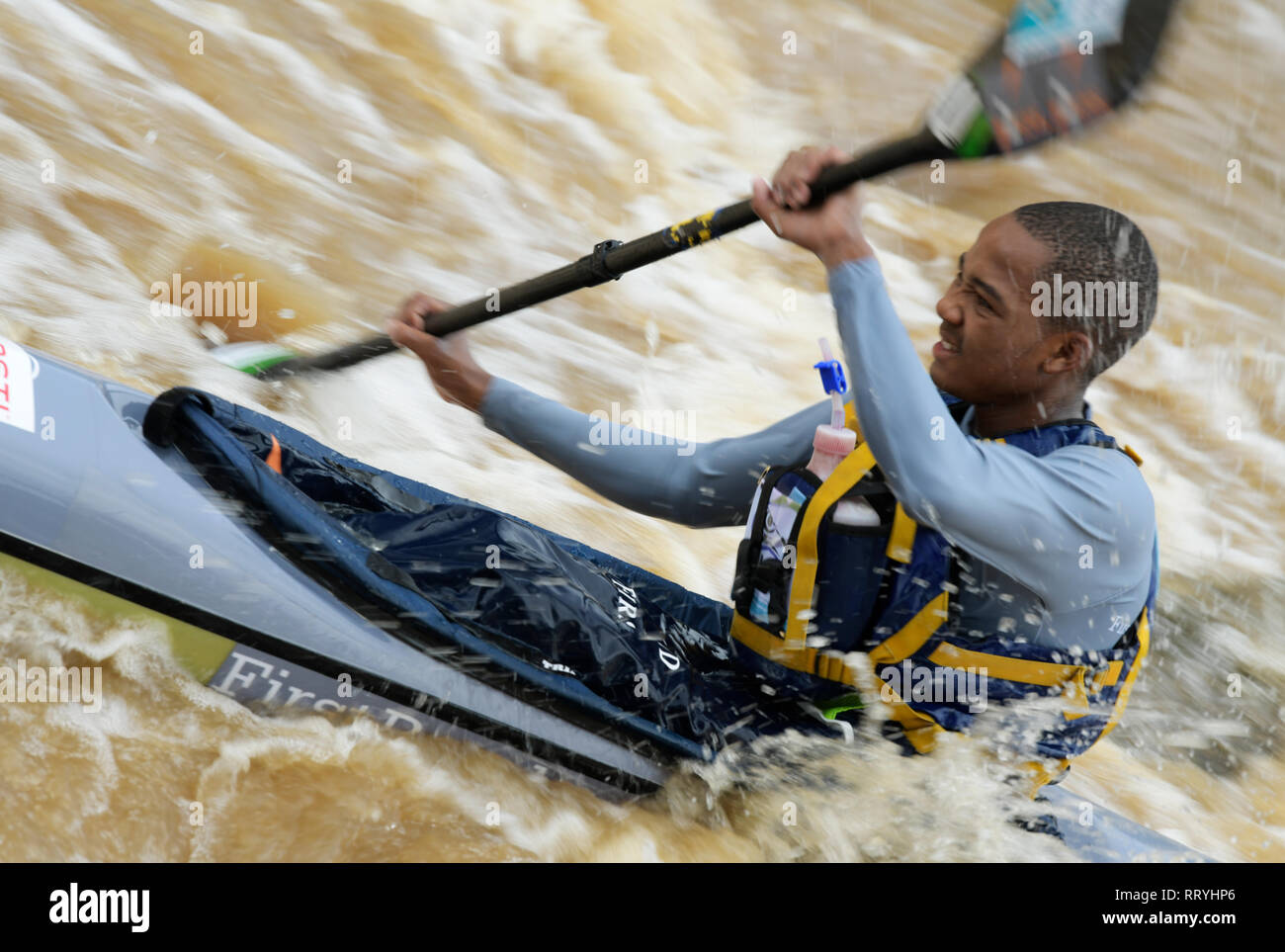 Durban, KwaZulu-Natal, South Africa, single adult man, competitor, paddle canoe, river, 2019 FNB Dusi Canoe Marathon, blur, people, canoeing, sport Stock Photo