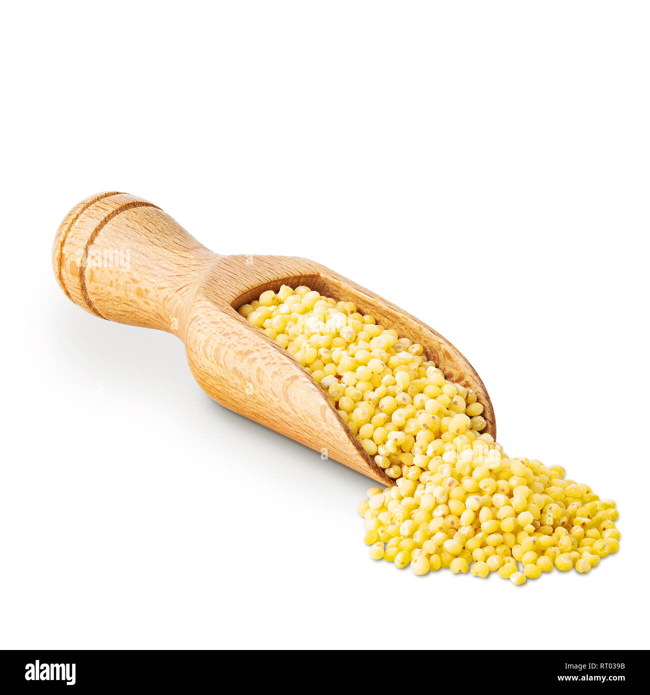 Millet in a wooden scoop isolated on white Stock Photo
