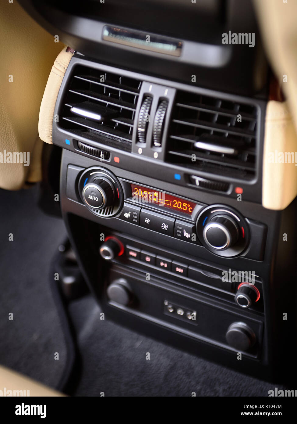 Modern car climate control panel for passengers in rear row with