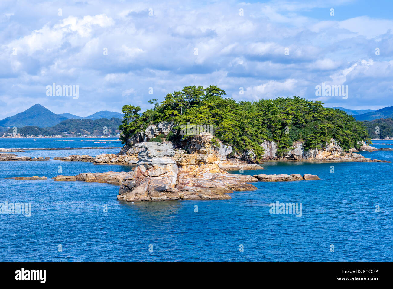 Many small islands over the blue ocean in sunny day, famous Kujukushima