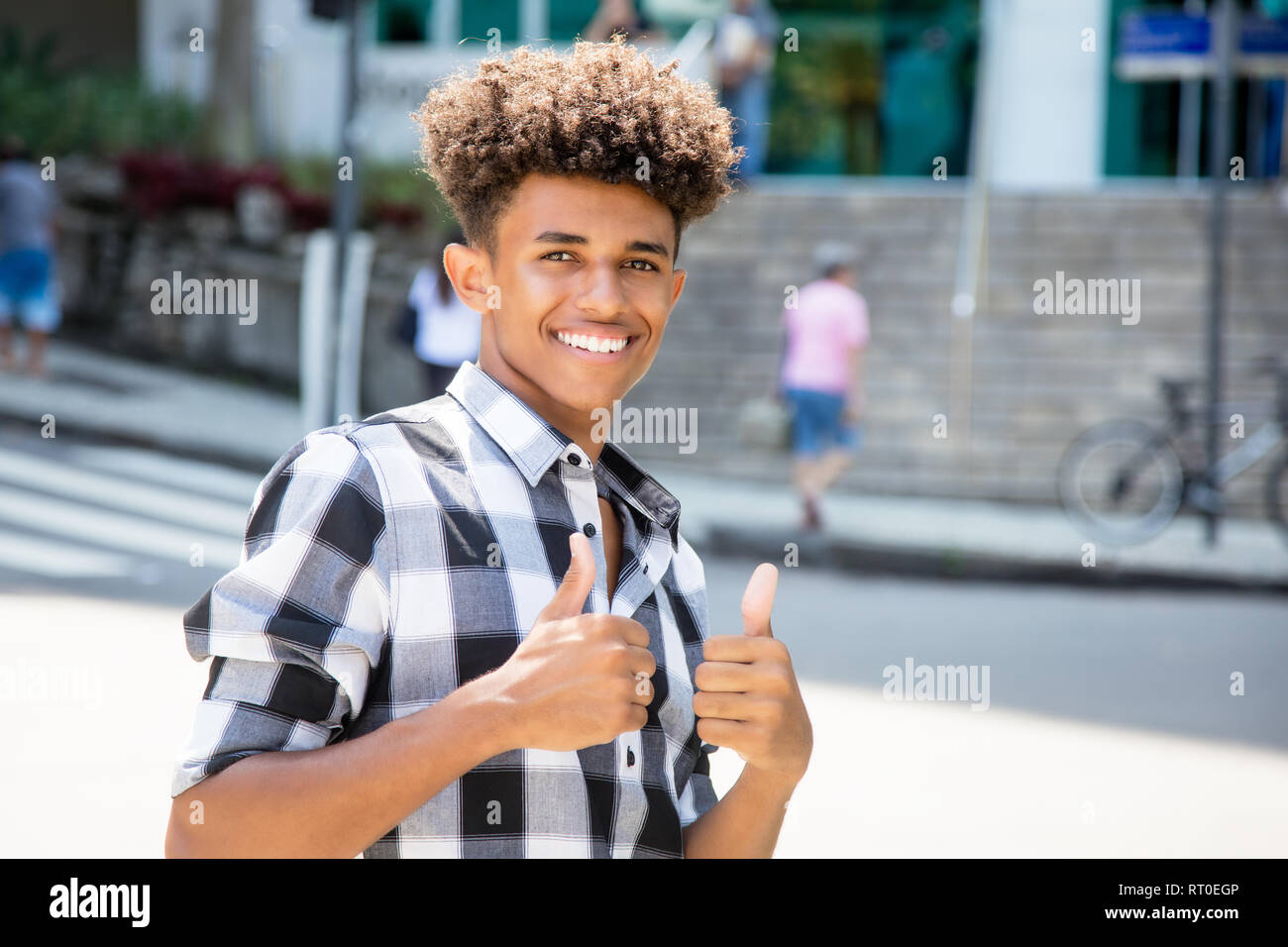 Teenager Thumbs Up African High Resolution Stock Photography and Images ...