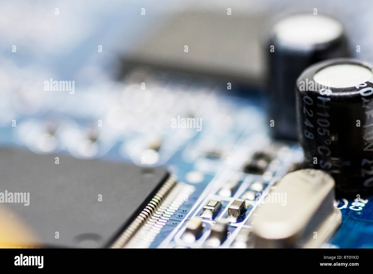 microchips and circuits on a board Stock Photo - Alamy