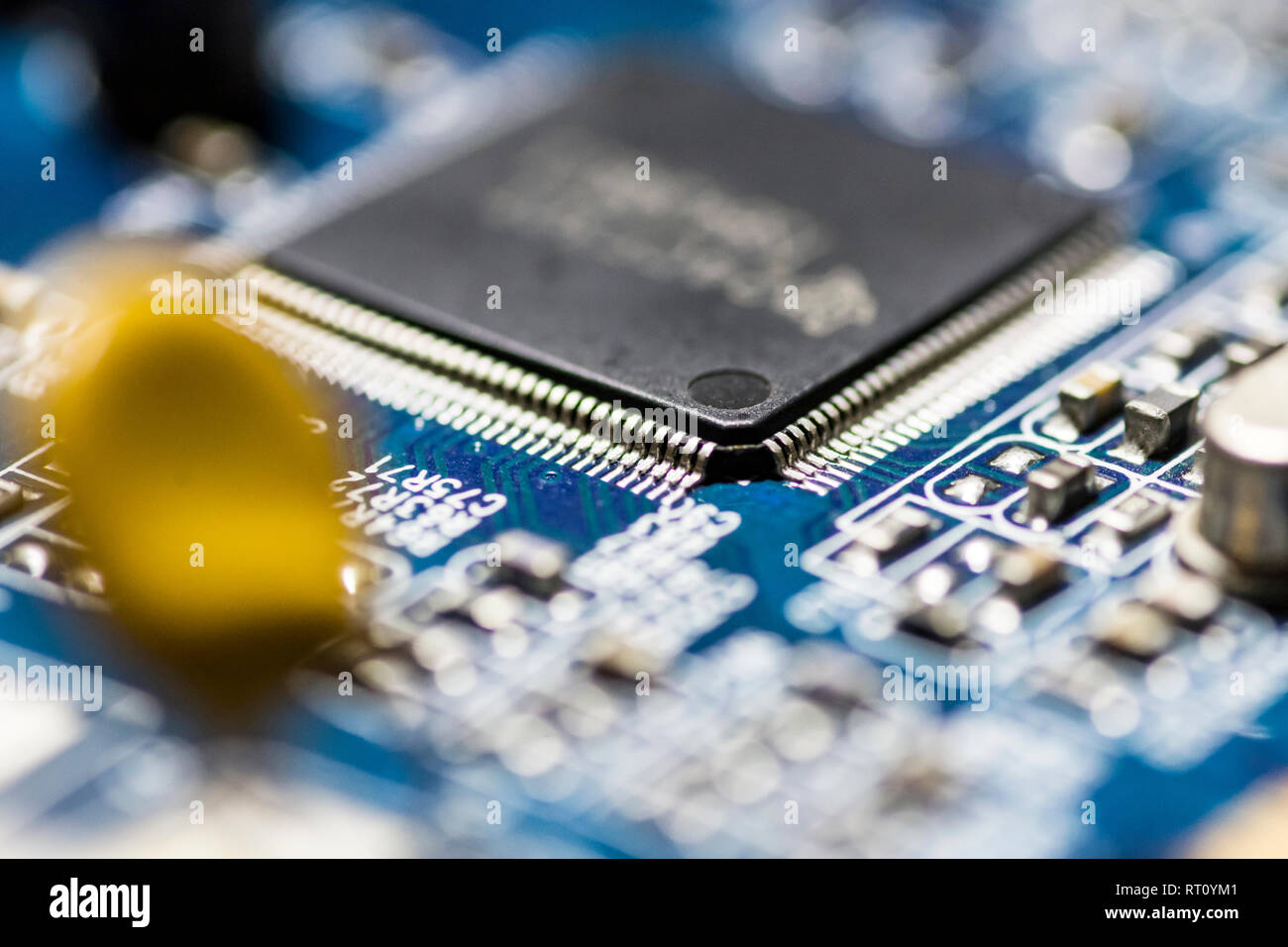 microchips and circuits on a board Stock Photo - Alamy