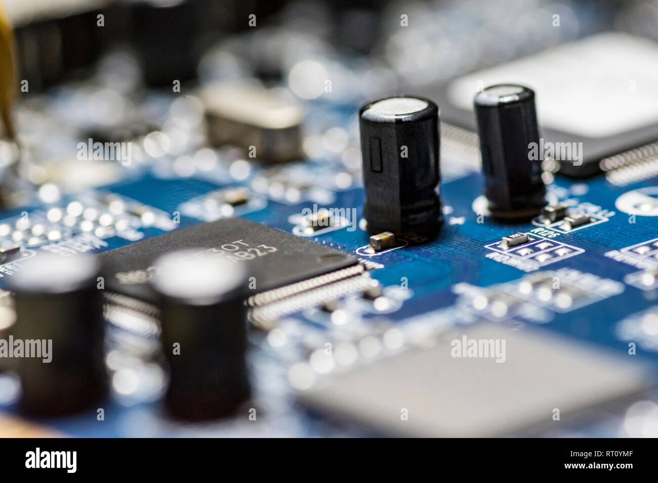 Microchips And Circuits On A Board Stock Photo - Alamy