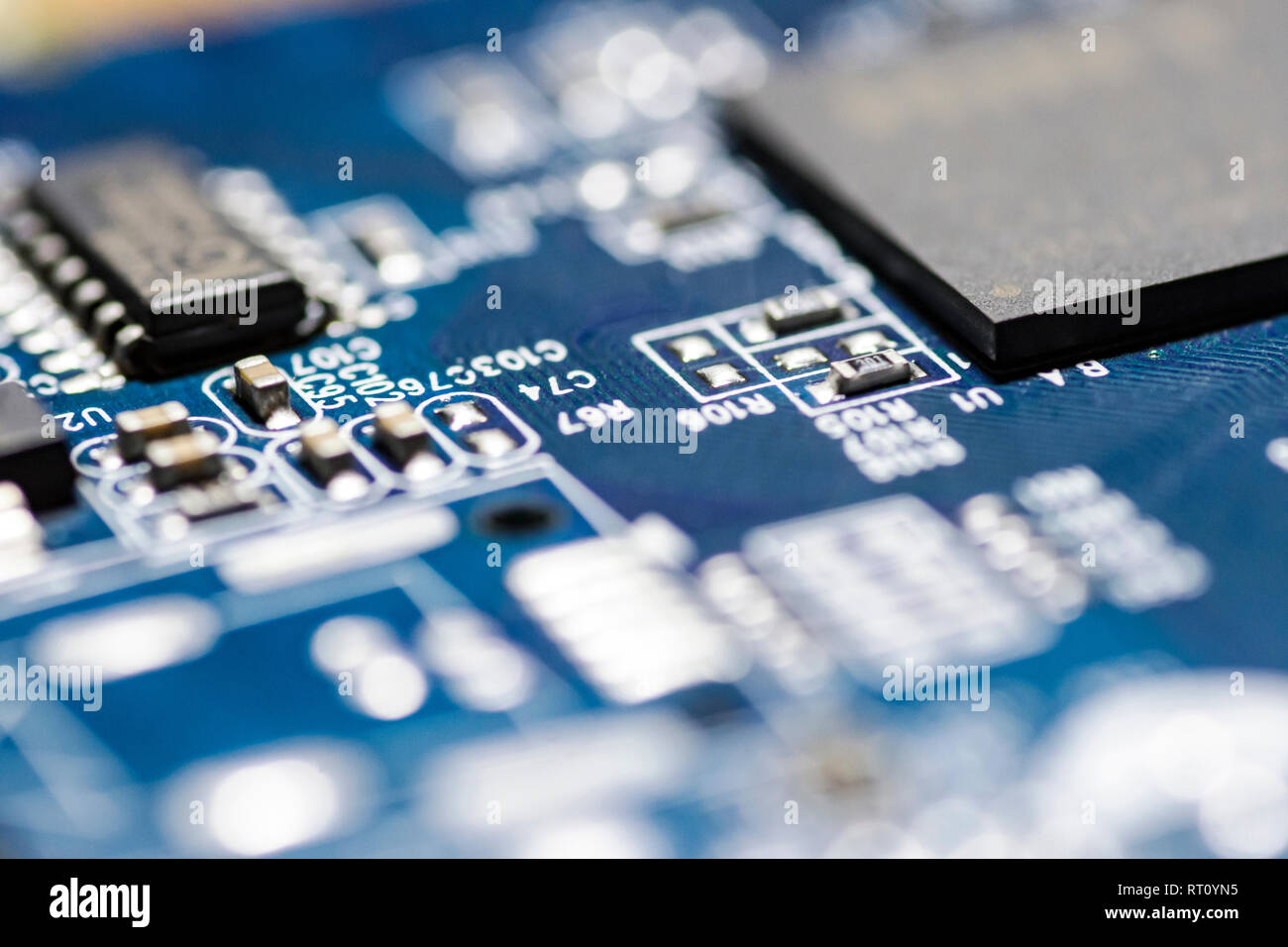 microchips and circuits on a board Stock Photo