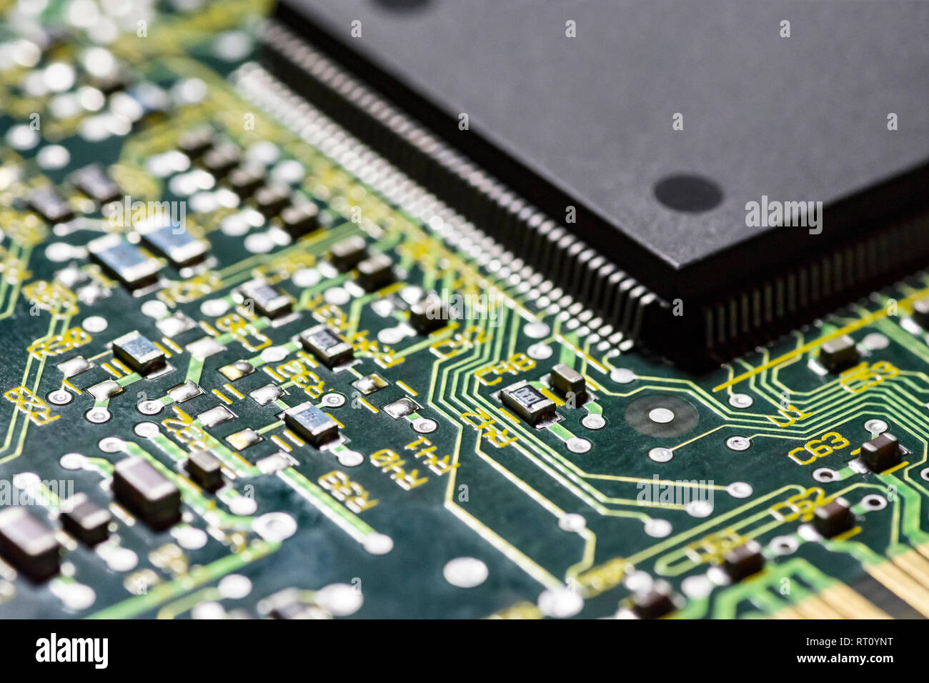 microchips and circuits on a board Stock Photo