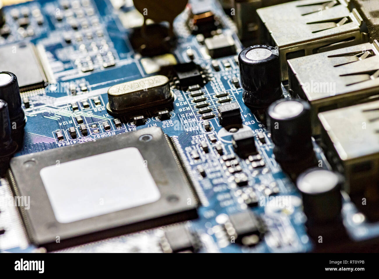 microchips and circuits on a board Stock Photo - Alamy