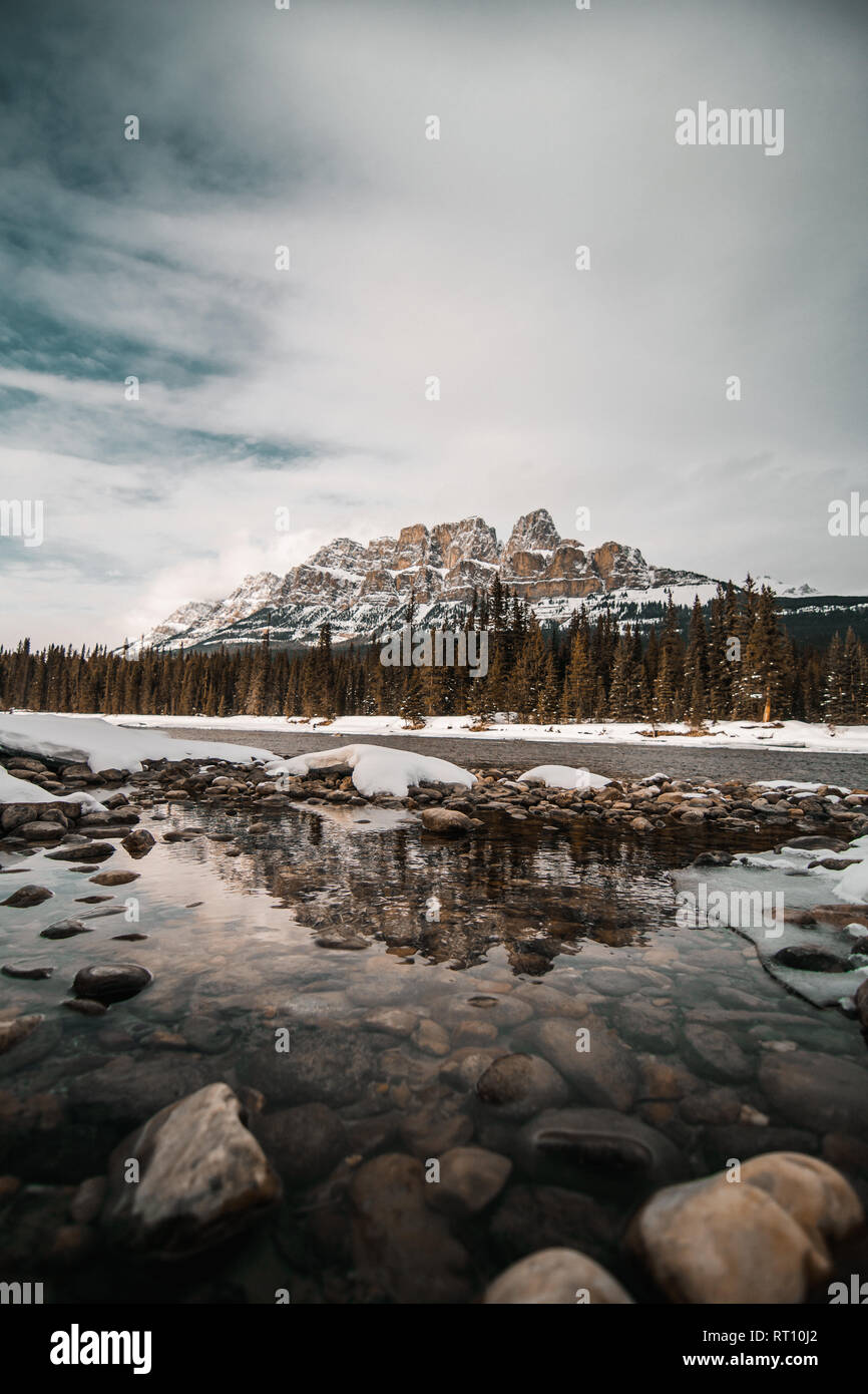 Scenic Bow river and Castle Mountain in winter, Banff National Park Alberta Canada Stock Photo