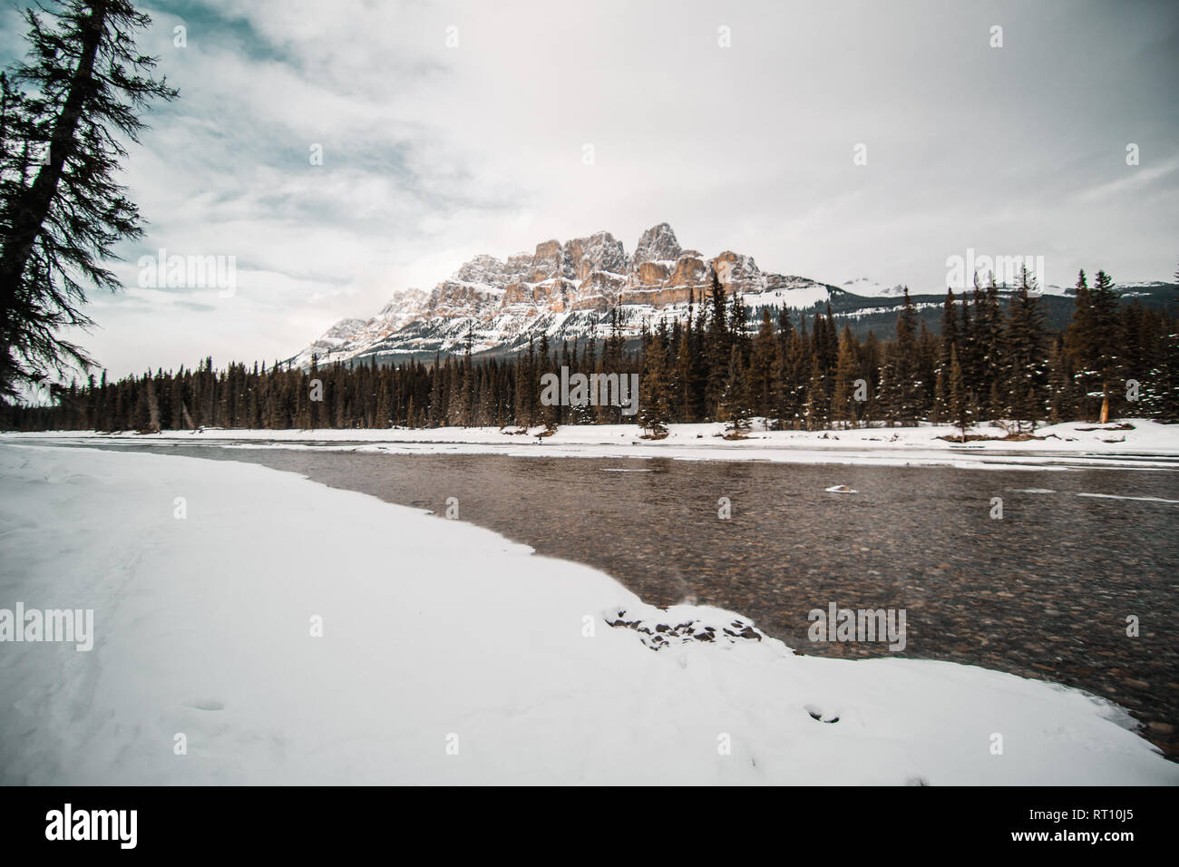 Scenic Bow river and Castle Mountain in winter, Banff National Park Alberta Canada Stock Photo