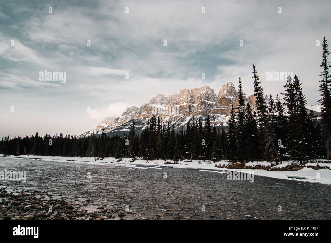 Scenic Bow river and Castle Mountain in winter, Banff National Park Alberta Canada Stock Photo