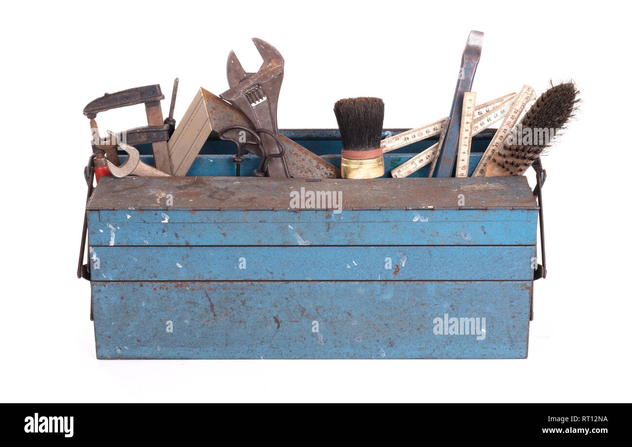 Old toolbox filled with vintage tools, isolated Stock Photo