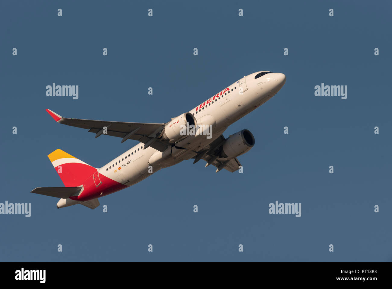 Iberia Airbus A320 jet airliner plane EC-MXY taking off from London Heathrow Airport, UK. Airline flight departure. Named Getafe Stock Photo