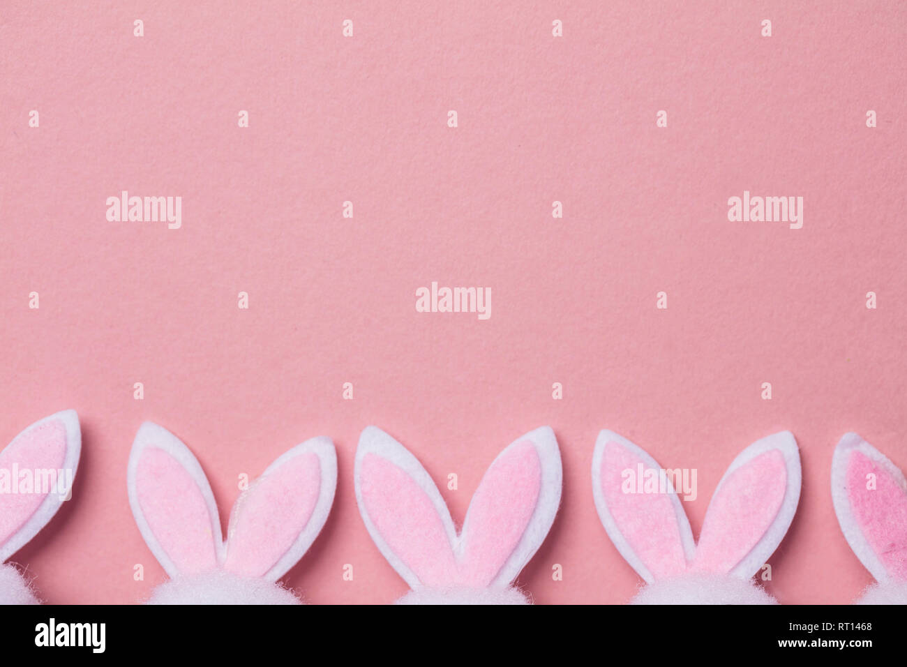 Bunny rabbit ears on a pastel pink background Stock Photo