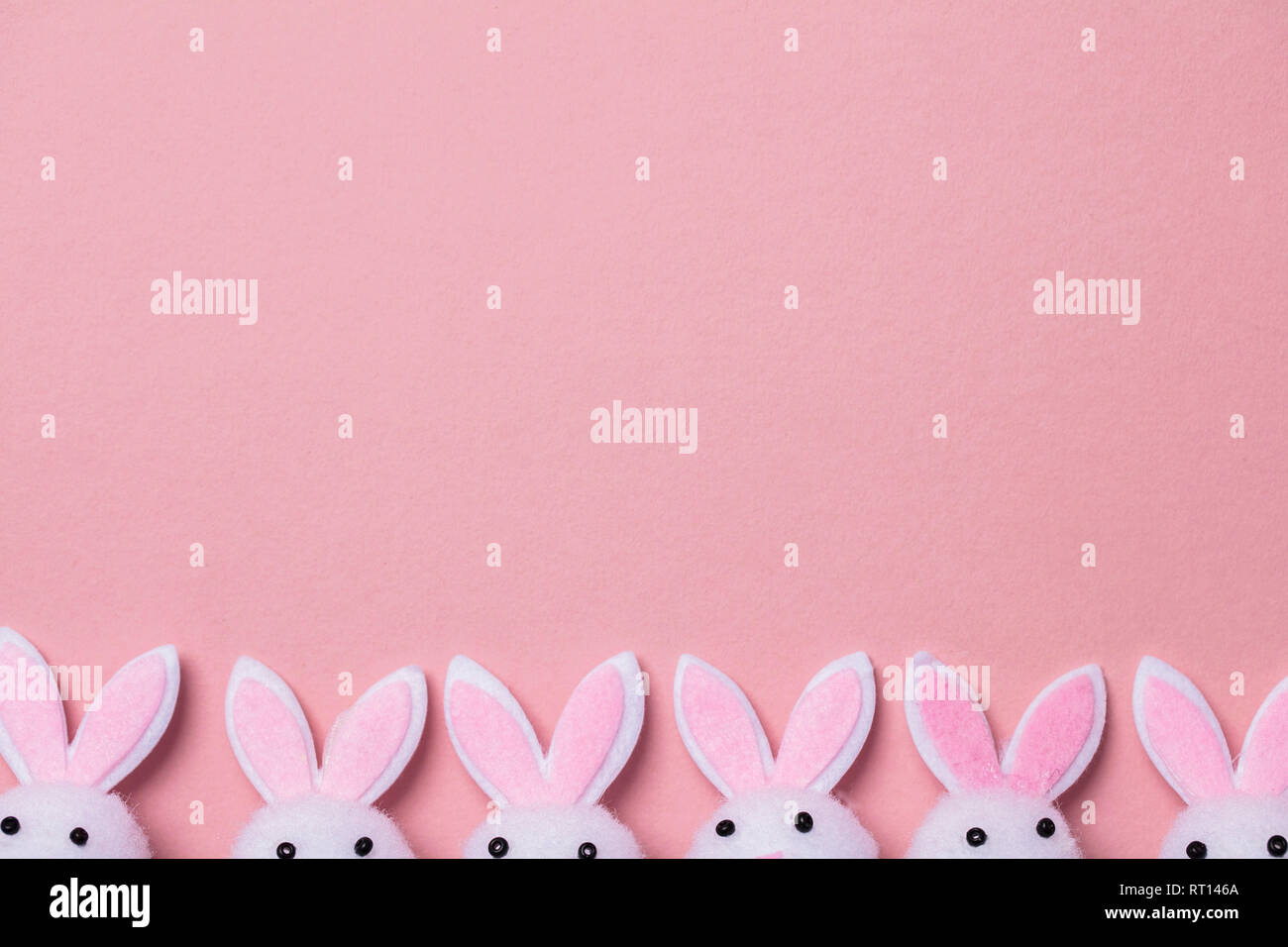 Bunny rabbit ears on a pastel pink background Stock Photo