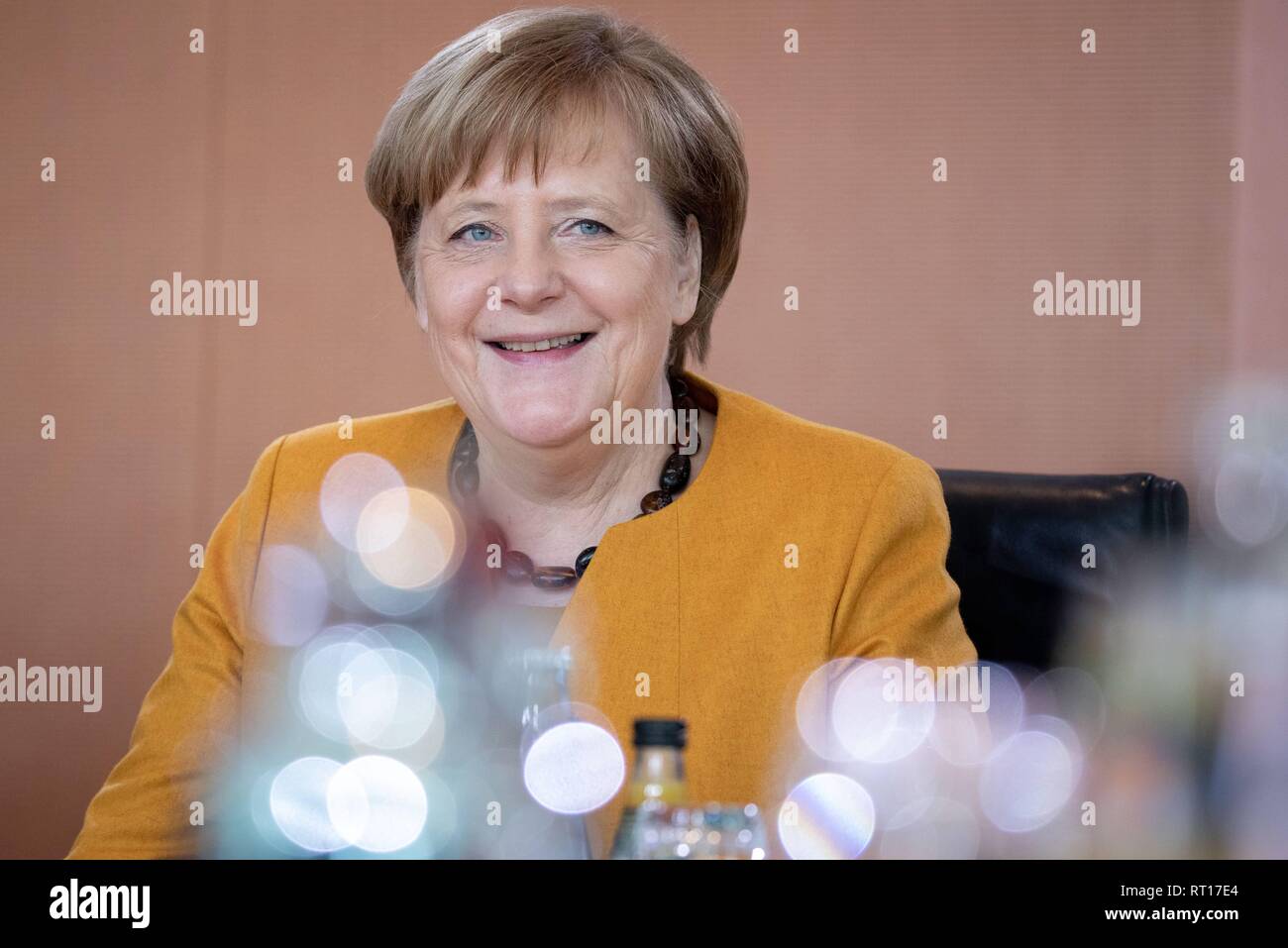 Berlin, Germany. 27th Feb, 2019. Chancellor Angela Merkel (CDU) attends the Federal Cabinet meeting at the Federal Chancellery. Topics included the draft law on the implementation of the 2021 census, the draft law on the sustained strengthening of the Bundeswehr's personnel readiness for action and the draft law on the reform of psychotherapist training. Credit: Kay Nietfeld/dpa/Alamy Live News Stock Photo