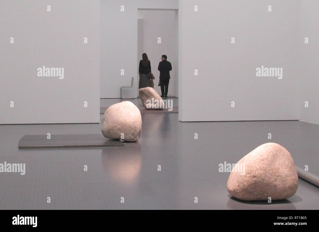 26 February 2019, France (France), Metz: View of Lee Ufan's installations 'Relatum/Dialogue' in the exhibition 'Habiter le temps' at the Centre Pompidou. Ufan, who studied philosophy in Japan after completing his art degree, uses his art to seek a new arrangement of already existing things by relating them to the surrounding space. (to dpa 'Metz dedicates star artist Lee Ufan retrospective: The art of silence' from 27.02.2019) Photo: Sabine Glaubitz/dpa Stock Photo