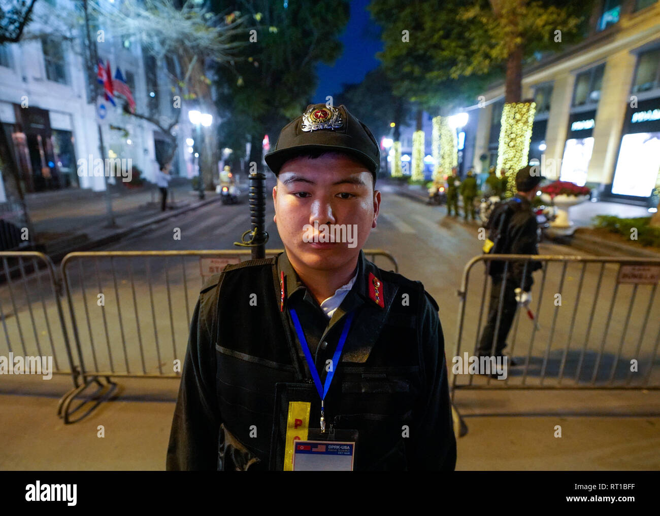 Hanoi, Vietnam. 27th Feb, 2019. February 27, 2019 - Hanoi, Vietnam - A security personnel stands guard to the street leading to the Sofitel Legend Metropole hotel where North Korean Leader Kim Jong Un and U.S. President Donald Trump will meet for dinner during the second North Korea-U.S. Summit in the capital city of Hanoi, Vietnam. Credit: Christopher Jue/ZUMA Wire/Alamy Live News Stock Photo