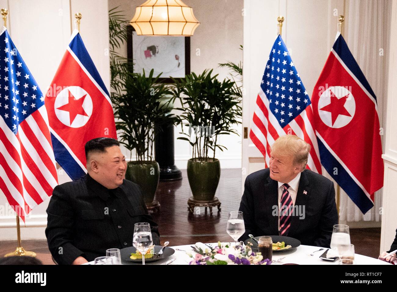 Hanoi, Vietnam. 27th Feb, 2019. U.S President Donald Trump and North Korean leader and Kim Jong Un sit together during a social dinner at the Sofitel Legend Metropole hotel February 27, 2019 in Hanoi, Vietnam. Credit: Planetpix/Alamy Live News Stock Photo