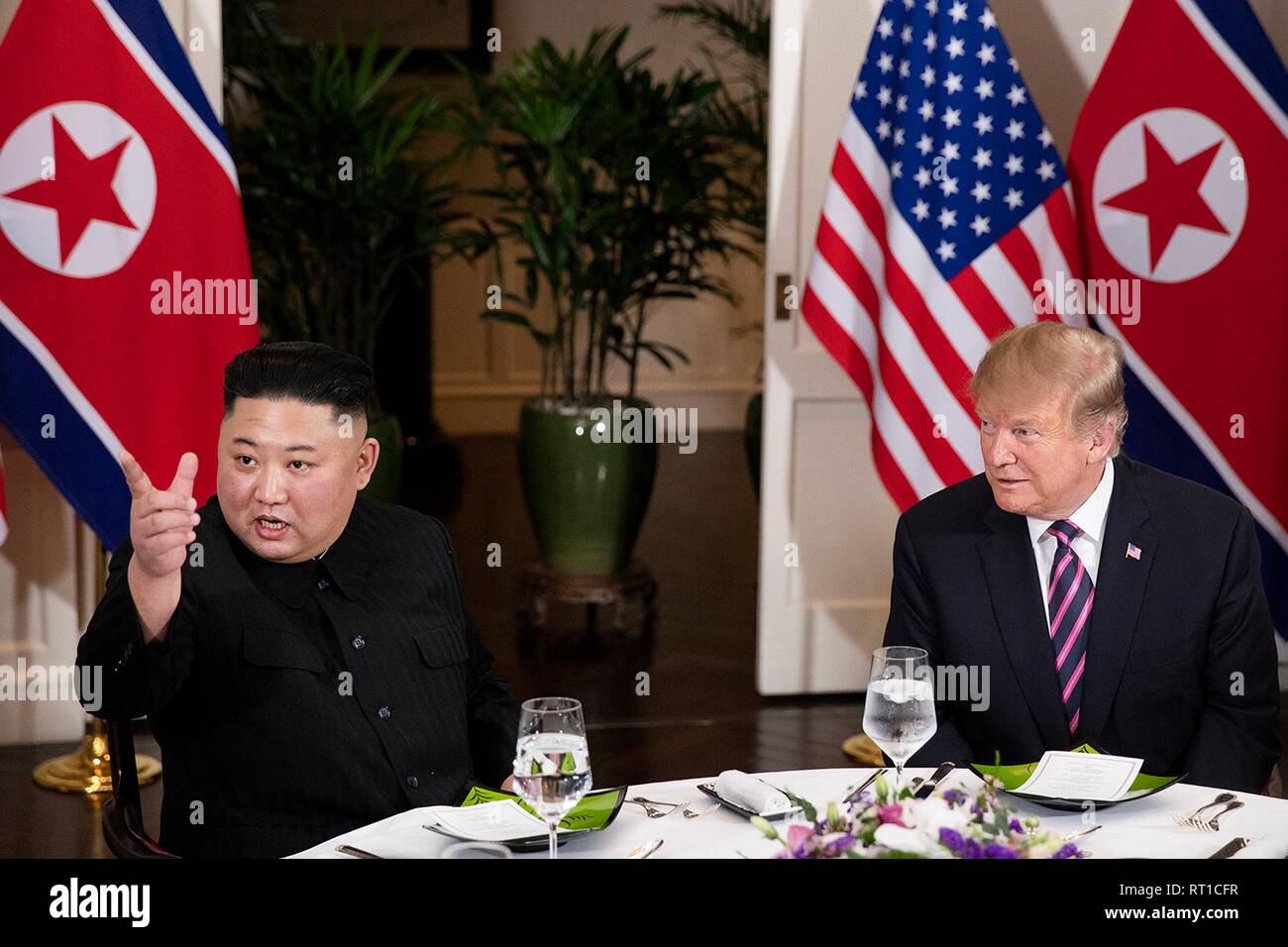 Hanoi, Vietnam. 27th Feb, 2019. U.S President Donald Trump and North Korean leader and Kim Jong Un sit together during a social dinner at the Sofitel Legend Metropole hotel February 27, 2019 in Hanoi, Vietnam. Credit: Planetpix/Alamy Live News Stock Photo