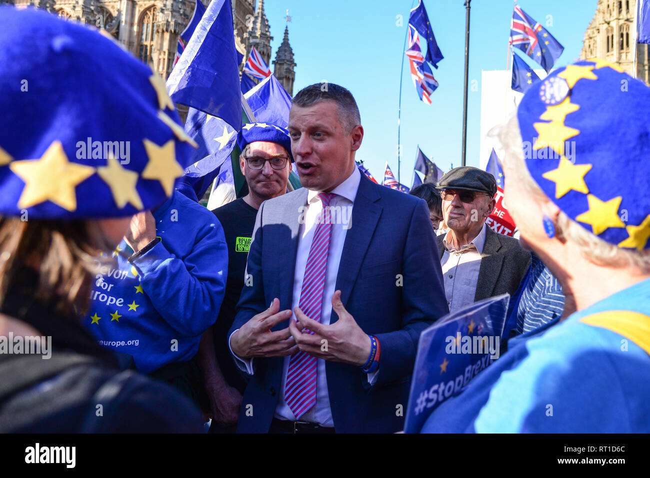 London, UK. 27th Feb, 2019. Luke Pollard, Labour & Co-operative MP for Plymouth, Sutton and Devonport, speaks to a group of remain campaigners opposite the House of Commons. Credit: Claire Doherty/Alamy Live News Stock Photo