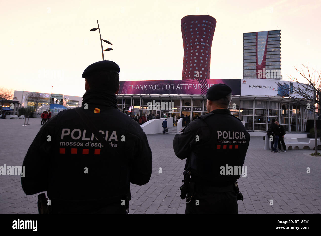 February 27, 2019 - LÂ´Hospitalet, Catalonia, Spain - Agents of the Catalan Police Mossos d'Escuadra are seen standing on guard at the entrance of the Mobile World Congress 2019 in Barcelona. Credit: Ramon Costa/SOPA Images/ZUMA Wire/Alamy Live News Stock Photo