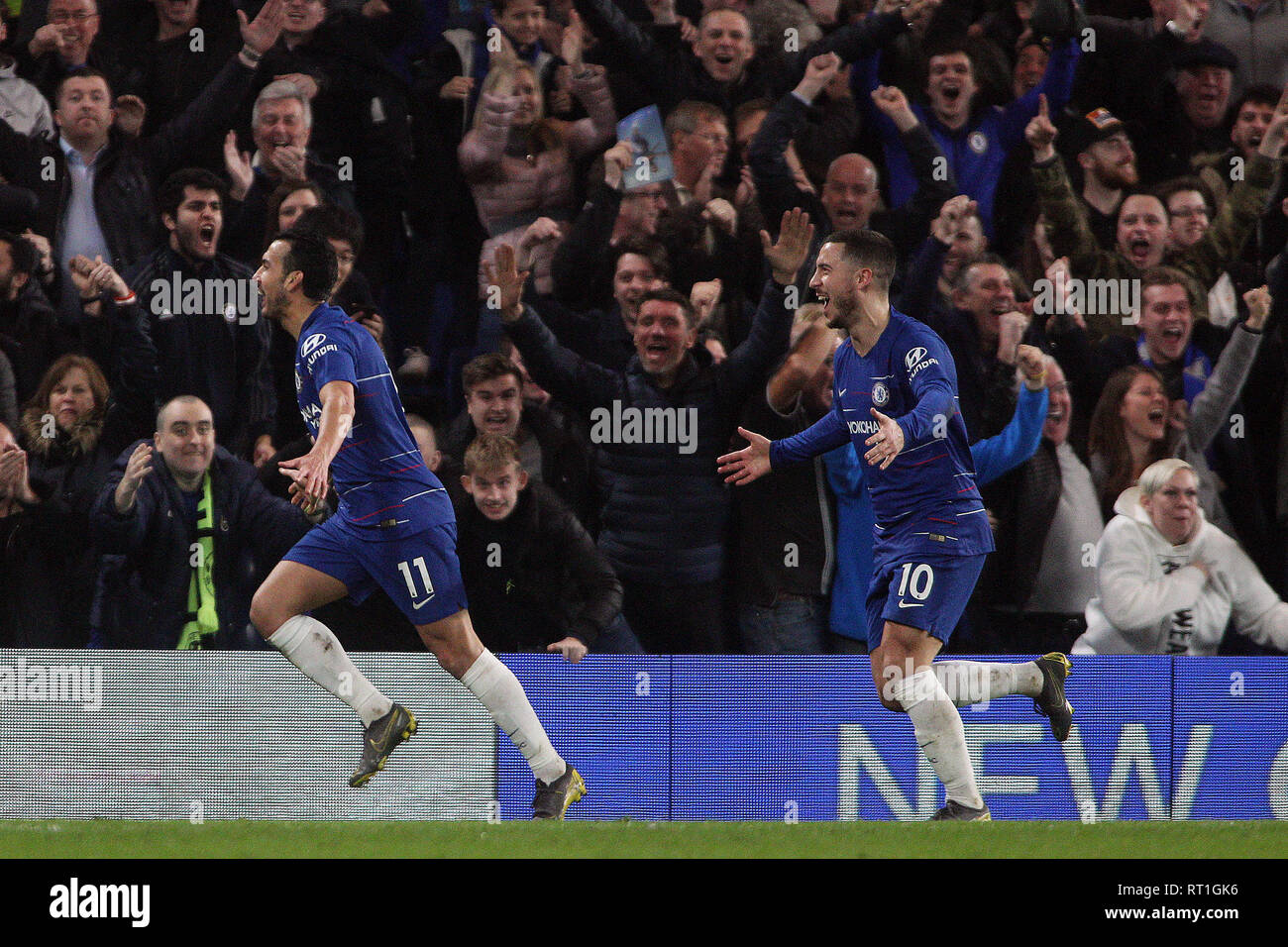 London, UK. 27th Feb, 2019. Pedro of Chelsea (L) celebrates after scoring his team's first goal. Premier League match, Chelsea v Tottenham Hotspur at Stamford Bridge in London on Wednesday 27th February 2019. this image may only be used for Editorial purposes. Editorial use only, license required for commercial use. No use in betting, games or a single club/league/player publications. pic by Steffan Bowen/ Credit: Andrew Orchard sports photography/Alamy Live News Stock Photo